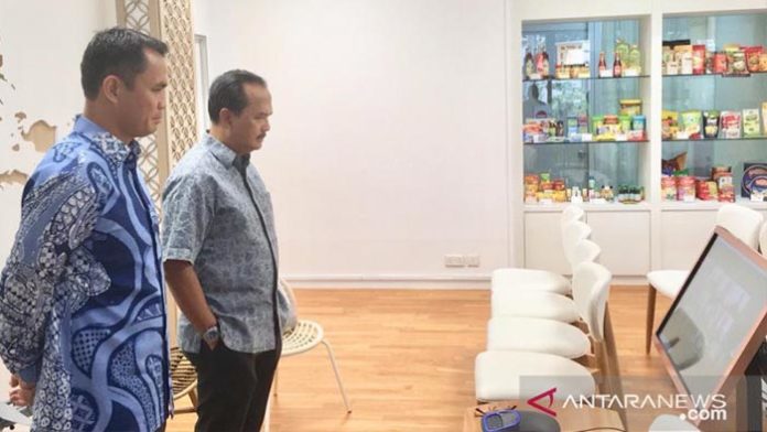 singapur dukung