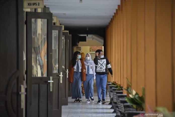 antarafoto-hari-pertama-masuk-sekolah-di-tengah-pandemi-covid-19-040121-as-2_1