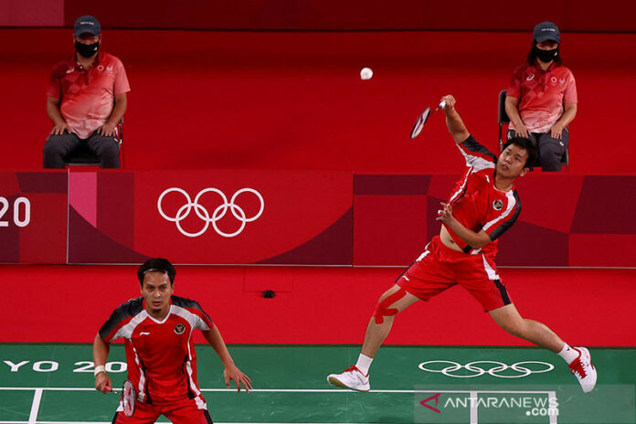 2021-07-24T110838Z_915388736_SP1EH7O0QB36F_RTRMADP_3_OLYMPICS-2020-BDM-M-DOUBLES-GP (1)