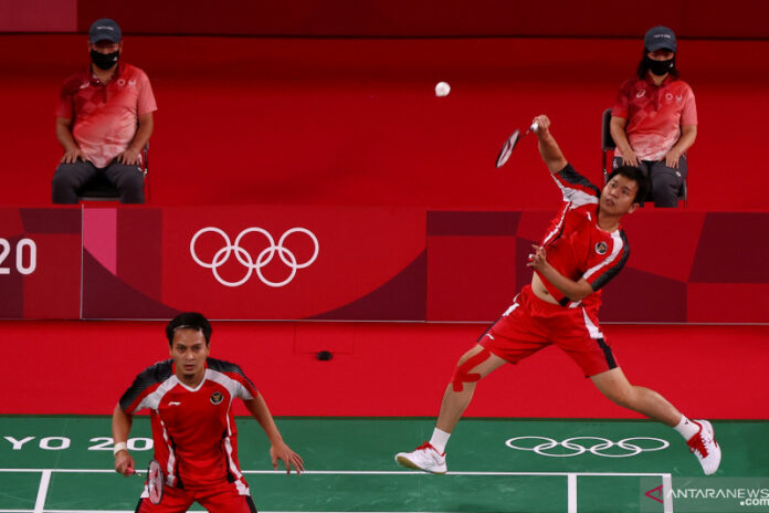 2021-07-24T110838Z_915388736_SP1EH7O0QB36F_RTRMADP_3_OLYMPICS-2020-BDM-M-DOUBLES-GP