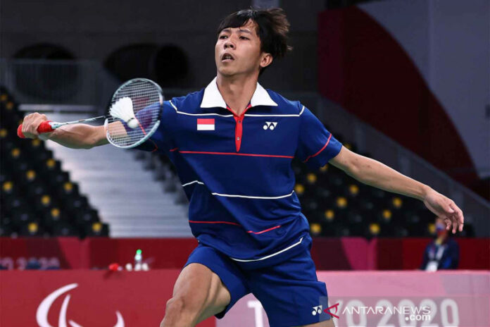 2021-09-03T043458Z_1498060569_SP1EH930CQ755_RTRMADP_3_PARALYMPICS-2020-BADMINTON-copy