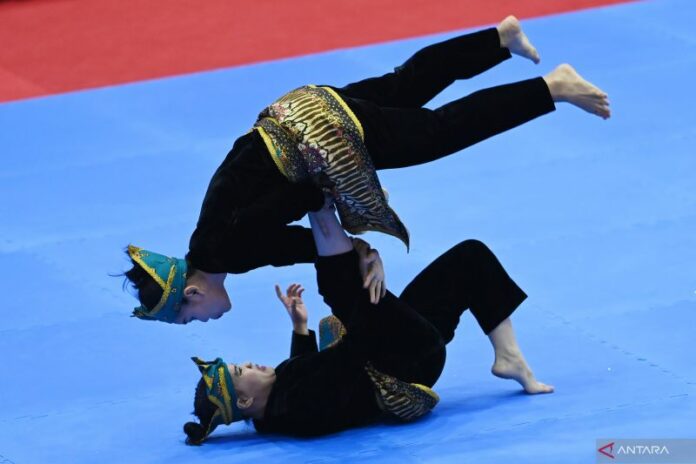 antarafoto-riska-ririn-kalahkan-pesilat-filipina-100522-app-8_1