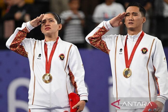 antarafoto-emas-bulutangkis-para
